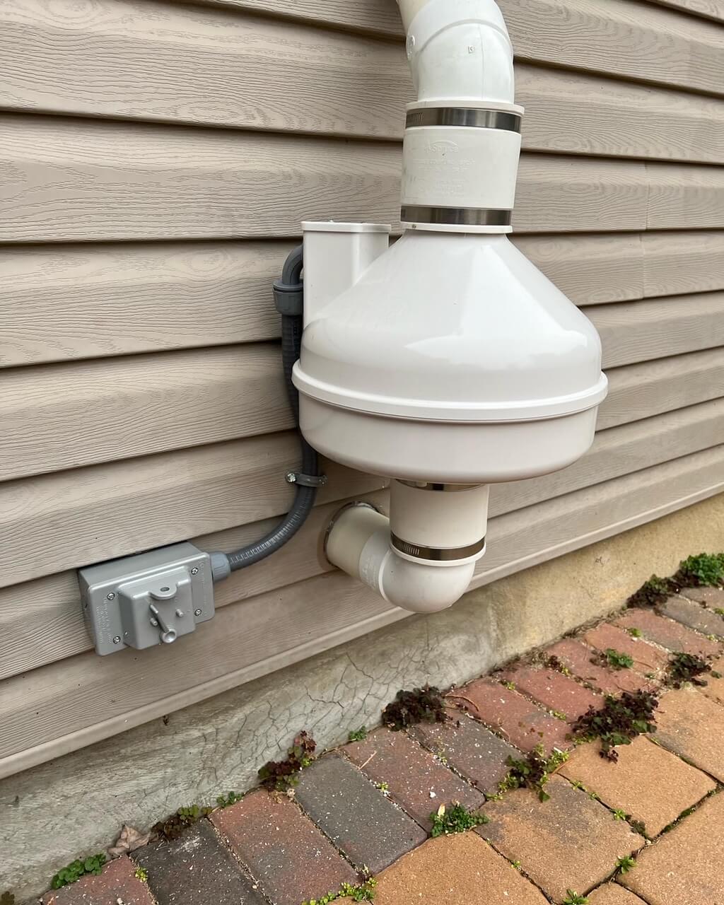 Close-up view of radon gas mitigation fan